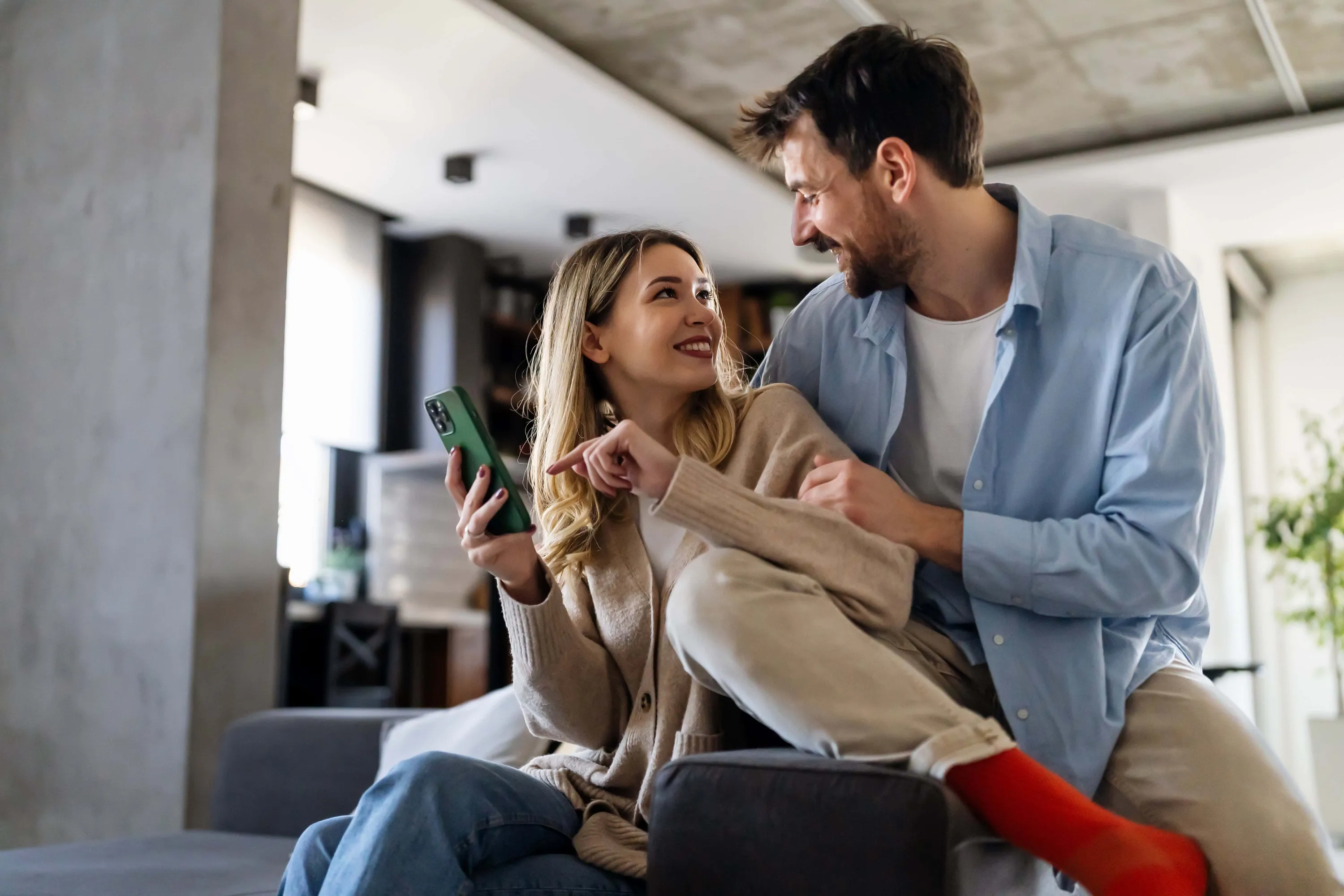 A person working on a laptop in a modern office.